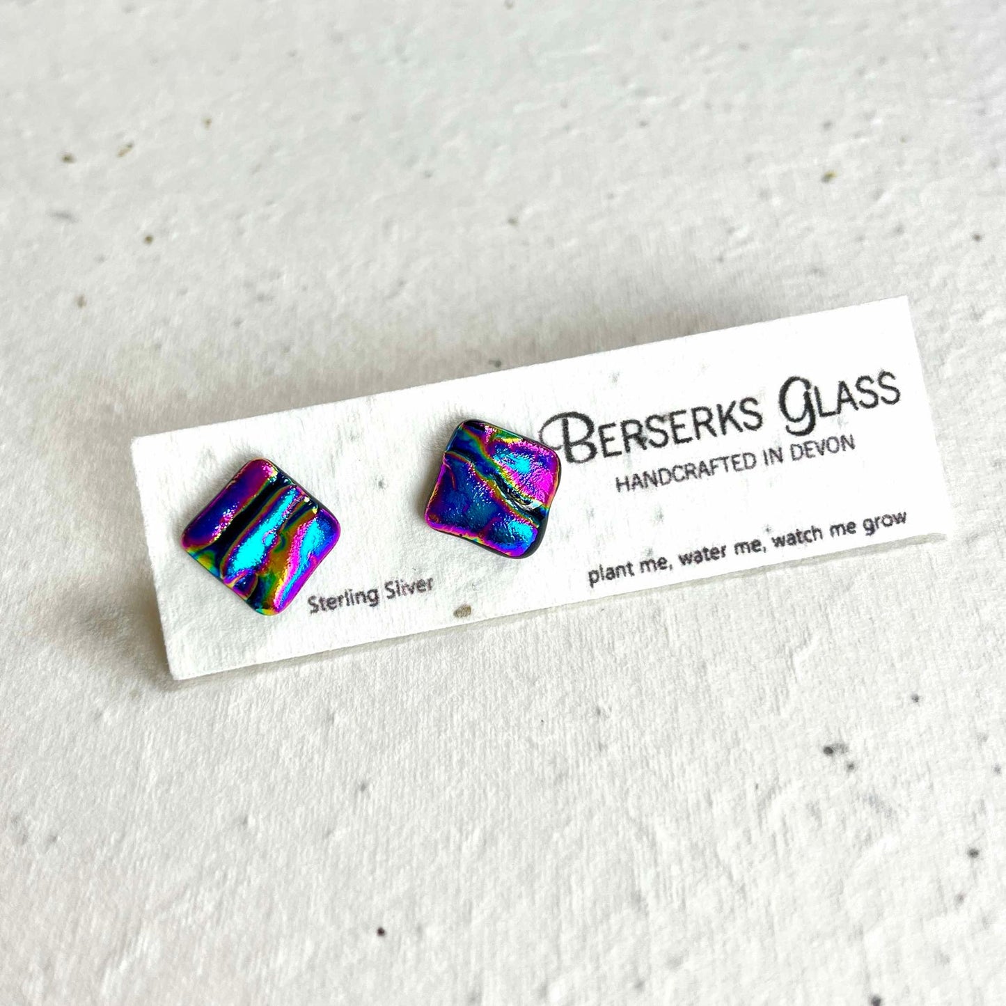 Dazzle Studs in sterling silver and crafted with fused dichroic glass