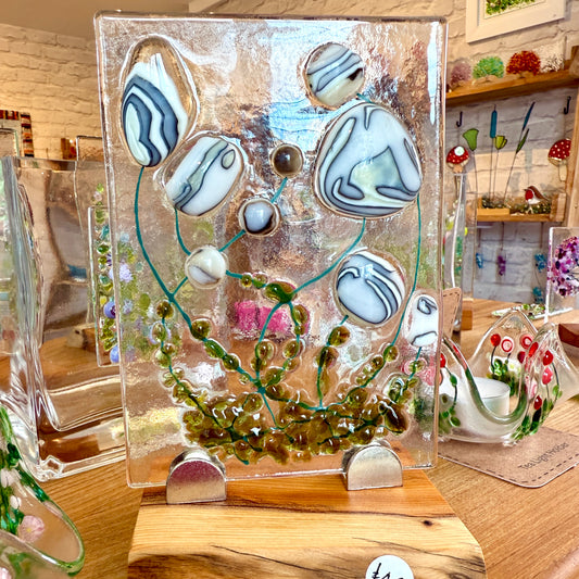 Delicious Art Piece on yew live edge stand.