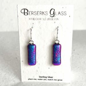 Dazzle long drops in sterling silver and crafted with fused dichroic glass