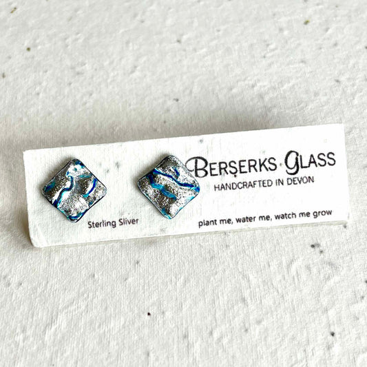 Dazzle Studs in sterling silver and crafted with fused dichroic glass