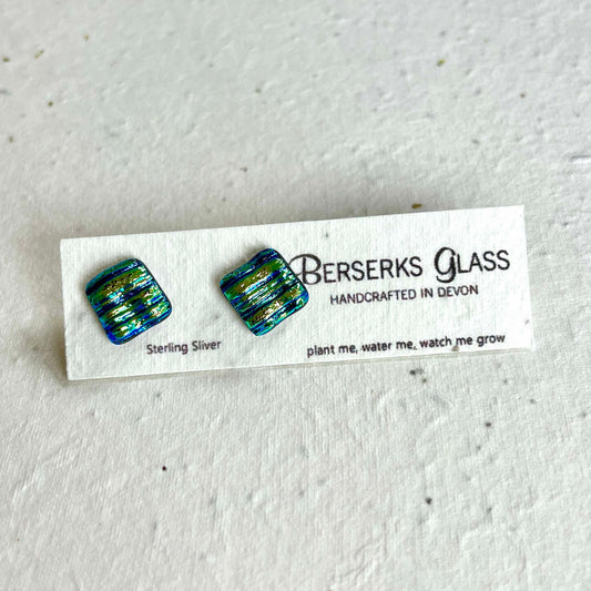 Dazzle Studs in sterling silver and crafted with fused dichroic glass