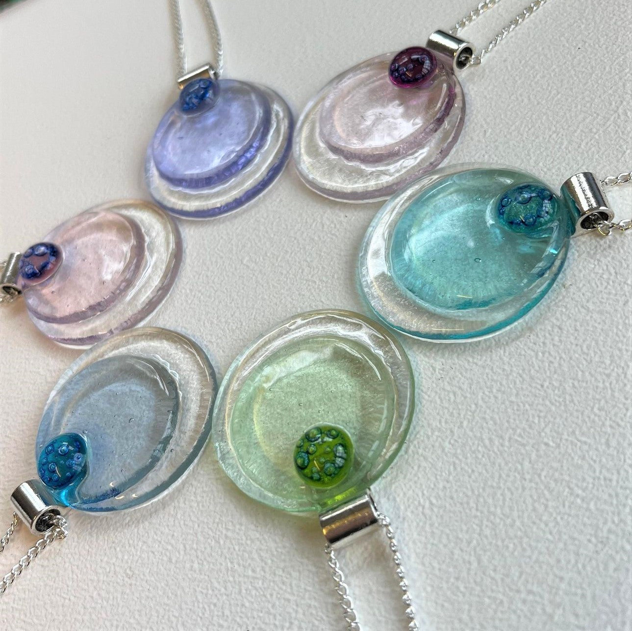 Delicate pastel shades round Deco Pendants
